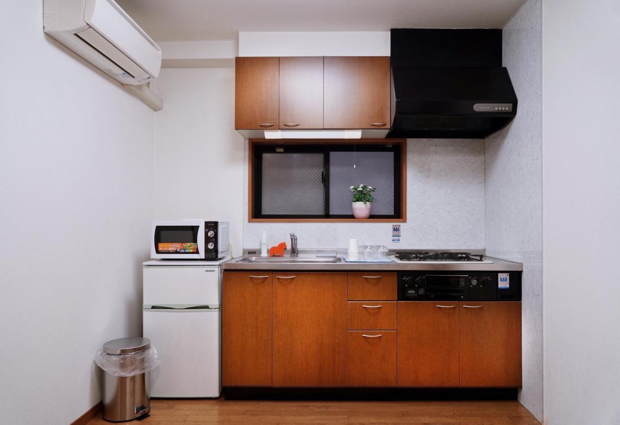 Apartamento Tg House Osaka Exterior foto