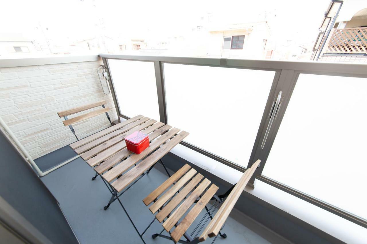 Apartamento Tg House Osaka Exterior foto