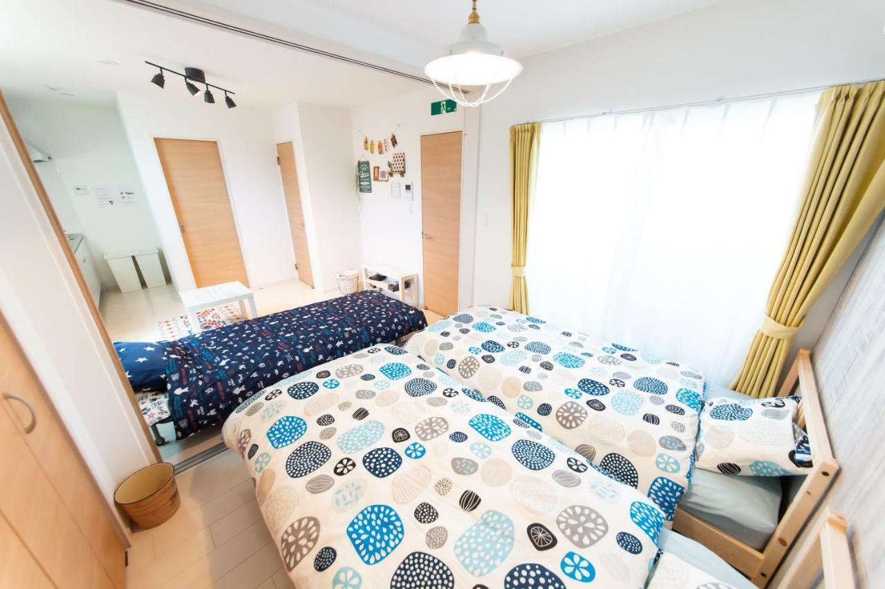 Apartamento Tg House Osaka Exterior foto